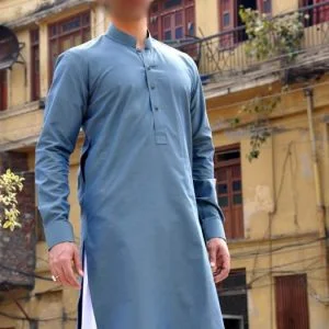 Manish malhotra men's plain kurta shalwar in columbia blue color. Buttoned cuffs kurta comes with white shalwar