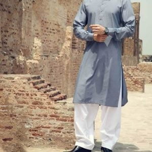 Junaid jamshed menswear kurta shalwar in cadet gray color. Buttoned cuffs kurta with white shalwar