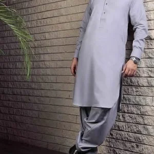 Amir adnan shalwar kameez suit for men in ash gray color. Buttoned cuffs kameez with matching shalwar