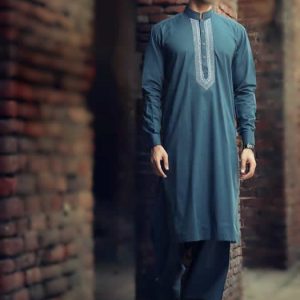 Embroidered kurta shalwar suit for men in Pine green. buttoned cuffs embroidered front kurta with matching shalwar