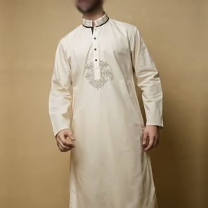 Traditional kurta salwar suit for men in cream color. Embroidered collar and front kurta shalwar in cotton silk fabric