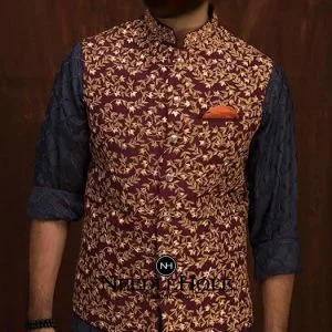 Raw silk single pocket groom waistcoat in maroon color with embroidery all over