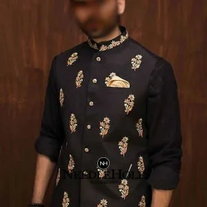 khaadi raw silk groom waistcoat in black color with single pocket and beautiful embroidery motif on front