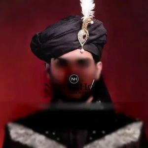Super Wedding Turban For Groom In Black Colour Features Jewelled Brooch On Front And Long Tail