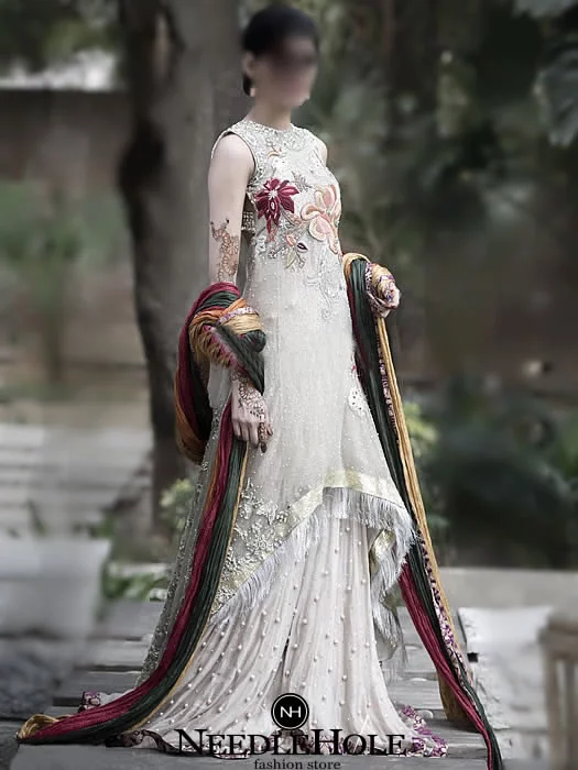 Elan engagement dress, bateu or boat neck high low hem long shirt with flared sharara and dupatta in off-white color Elan engagement dress, bateu or boat neck high low hem long shirt with flared sharara and dupatta in off-white color
