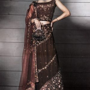 Traditional Indian bridal outfit featured asymmetrical layered lehenga skirt