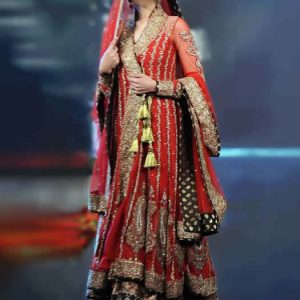 Bridal angrakha dress design for bride in sangria color. Decollete neck wrap style bridal angrakha frock comes with embellished wedding lehenga and bridal veils