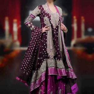 Shop pakistani wedding lehenga online for bride. Magnanimous u-neck palatinate purple bridal shirt has full sleeves and high-low hem comes with red-violet embellished bridal lehenga and palatinate purple bridal dupatta