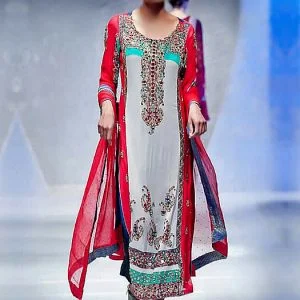 Nida azwer party dress in multicolors, round neckline embellished long shirt with straight trousers and veils