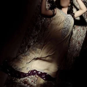 Stunning partywear dress for girls by asifa & nabeel, embellished v neck, slight flared long shirt with capri pants and veils in vanilla color