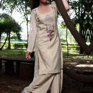 Four piece party wear dress in tan color, embroidered over top with bustier neck and full sleeves comes embroidered long under top, flared trouser and dupatta