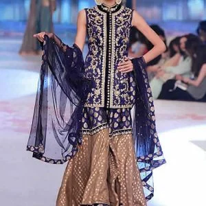 Engagement lehenga dress in federal blue color, embellished stand collar short length straight shirt with two legged embellished gharara and dupatta