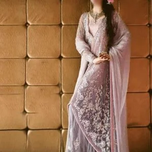 Double layer wedding gown dress for bride dip dyed in sea shell and taupe gray color. Embellished full sleeves round neck flared double layer bridal gown comes with plain sharara and embellished bridal dupatta