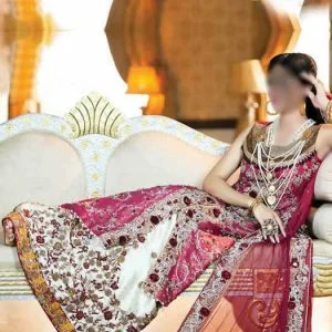 Amazing raspberry wedding lehenga dress for bride. Embellished Round neck and front slit bridal shirt with embellished bridal lehenga and bridal dupatta