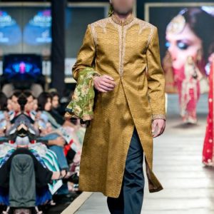 Old gold men's sherwani in jamawar fabric, embellished collar, neck, shoulders, front and sleeves cuffs