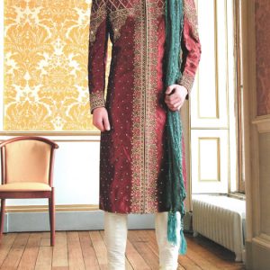 Wedding sherwani for men in fire engine red color, embellished collar, front and sleeves