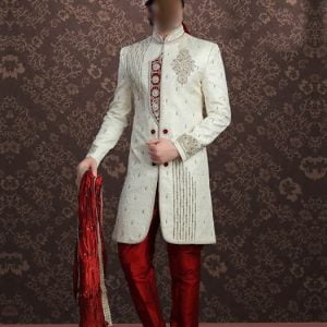 Pakistani sherwani suit in ivory color, heavy embellished collar, front and sleeves