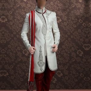 Beautiful sherwani for men in ivory color with rounded hem, embellishments on collar, front and sleeves