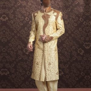 Men's sherwani suit in cream color with straight hem, beautiful embellishments on collar, front and sleeves