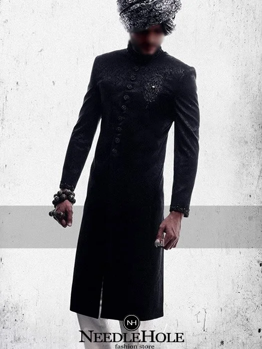 Jamawar sherwani for men in black colour, embroidery on sleeves cuff, motif and buttons detail on sherwani front