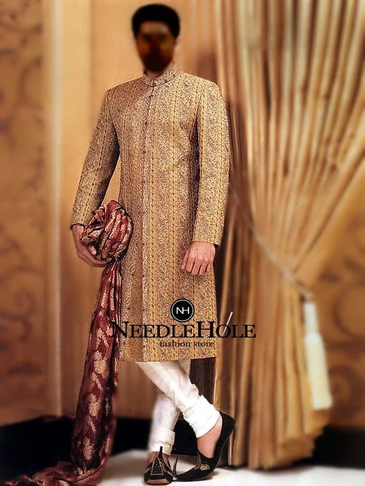 Fully embroidered royal golden sherwani with churidar pajama for groom in raw silk fabric