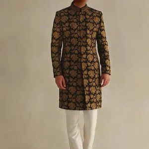 Black fully embroidered groom sherwani for men wedding in raw silk fabric, comes with kurta pajama in offwhite color