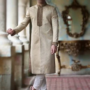 Jamawar men sherwani for groom wedding in golden color, comes with kurta pajama in offwhite color