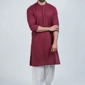 Man bright maroon kurta with offwhite shalwar for sister wedding party